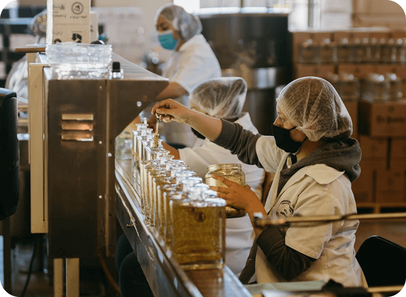 Shop floor workers using Kladana Cloud ERP System to receive tasks, mark progress, and track production in real time